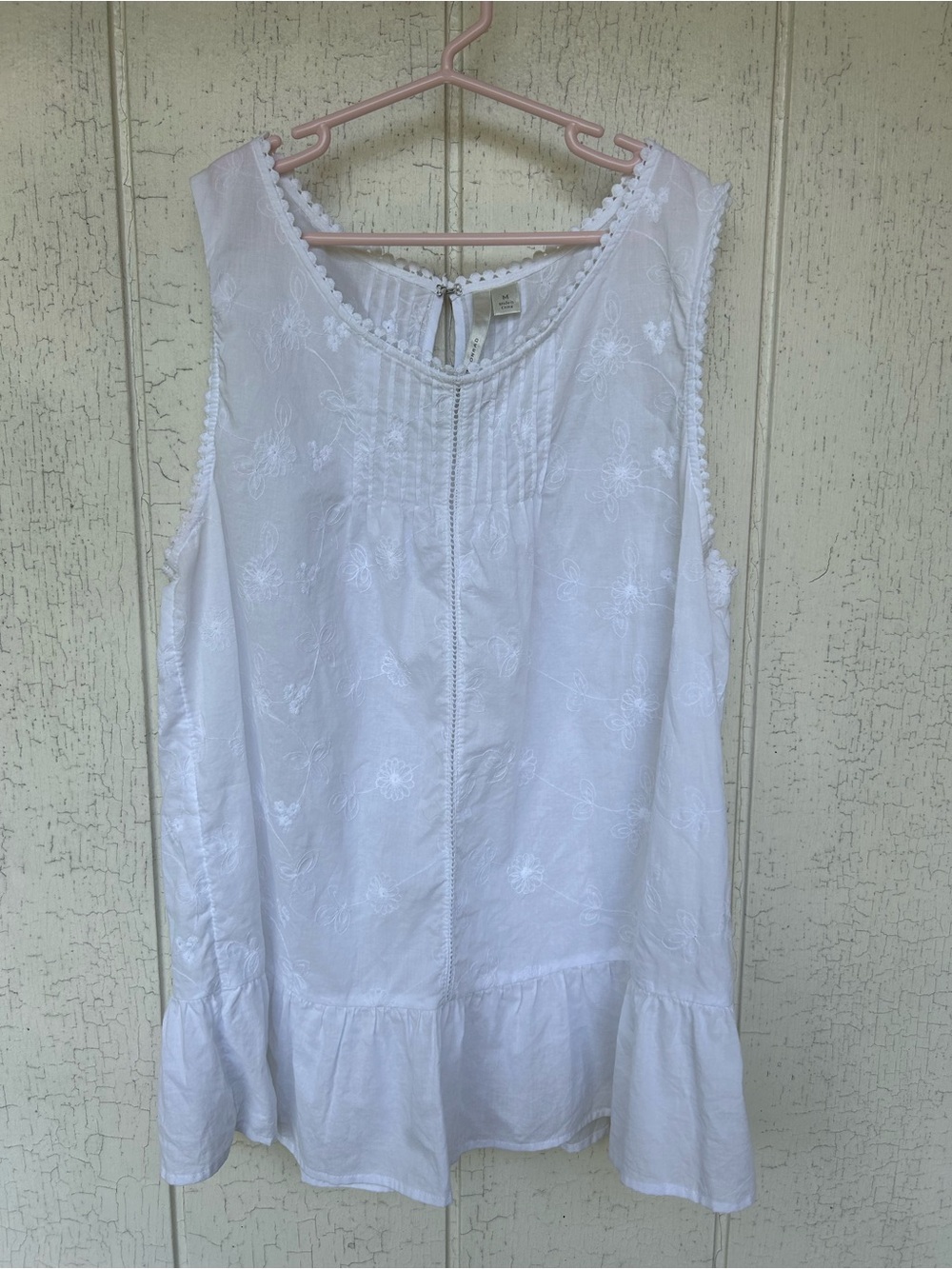 LC Lauren Conrad White Sleeveless Embroidered Peplum Tunic